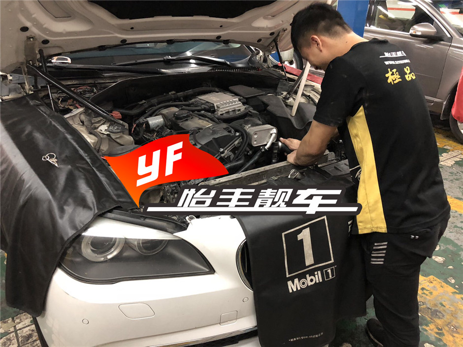 宝马730LI发动机水温高 水箱漏水